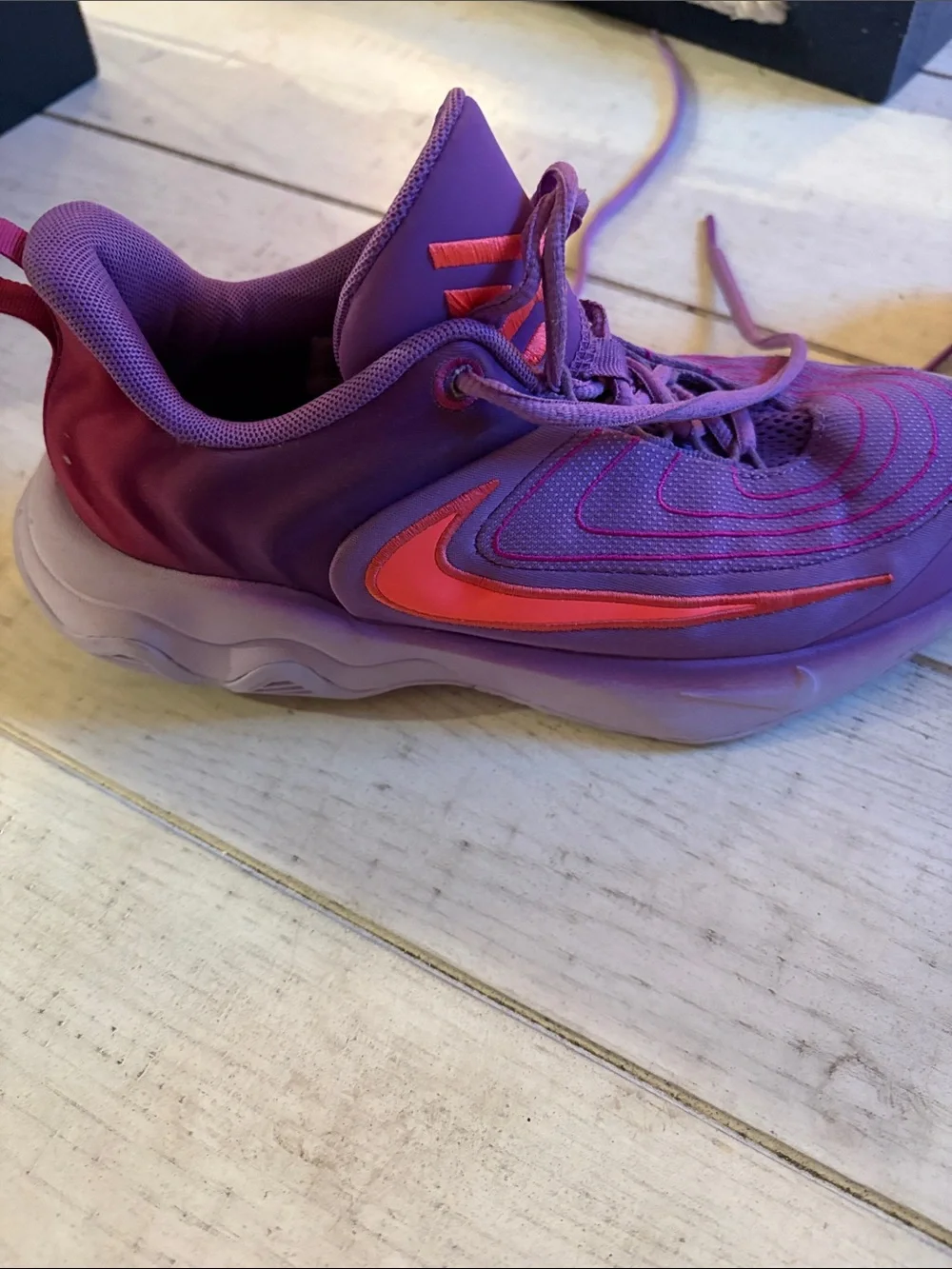 Nike Kids Purple Sneakers with Orange Swoosh